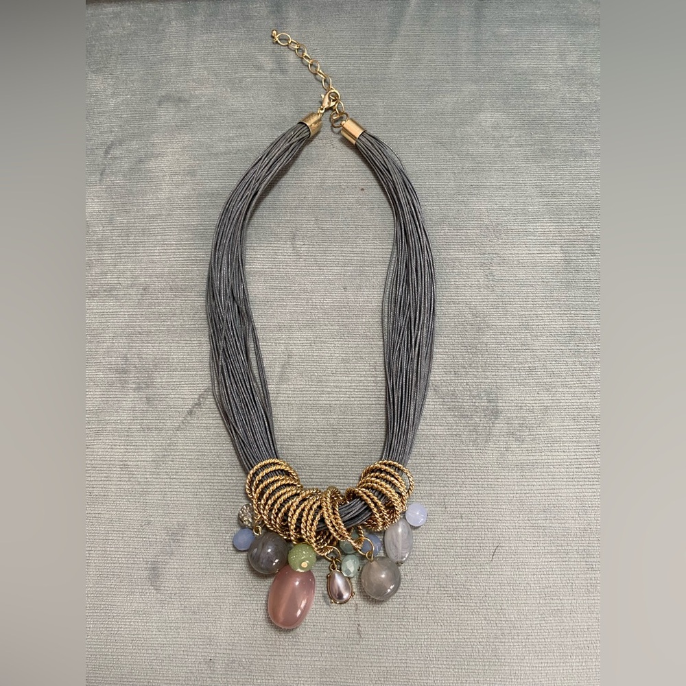 Statement necklace multi strand, gray cord,goldtone rings, variety, glass beads